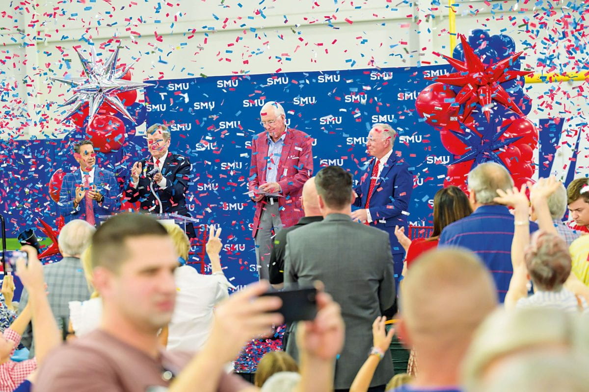 Celebration of SMU's joining of the Atlantic Coast Conference, confetti is flying in the air while fans of the SMU Mustangs celebrate and cheer